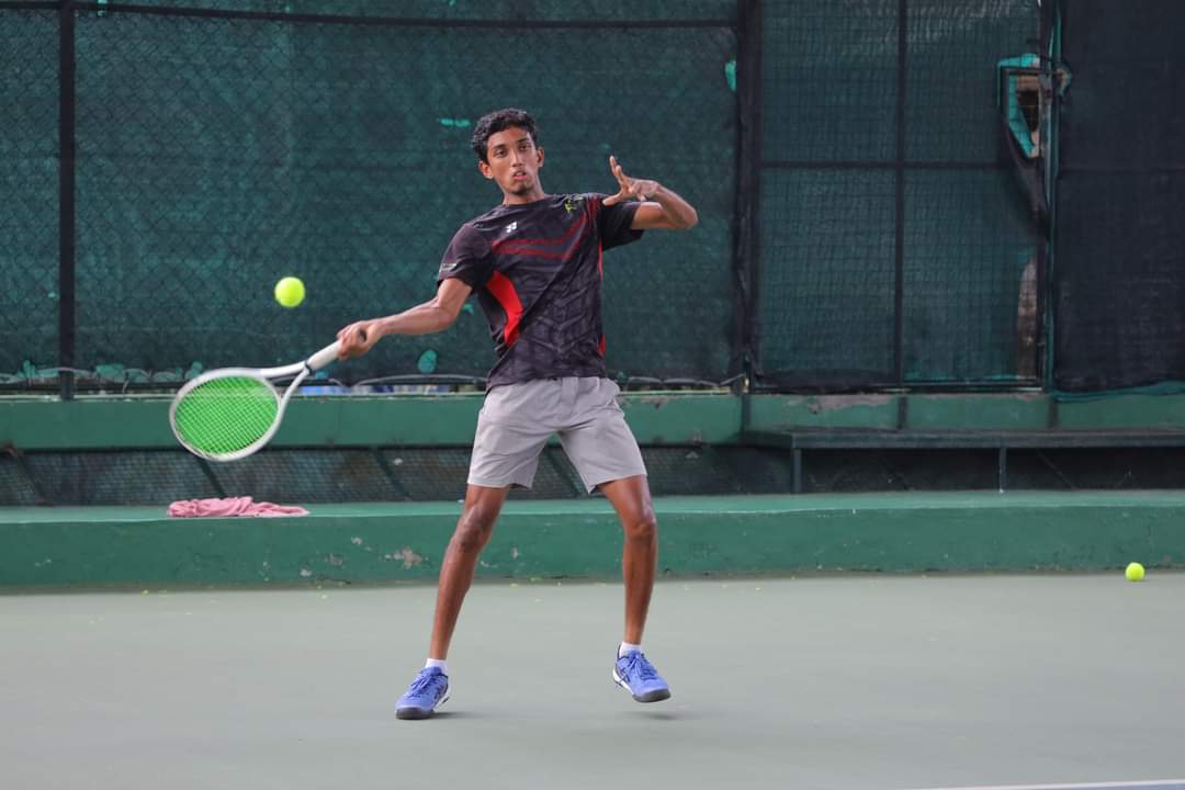 CTC player hitting a backhand on court